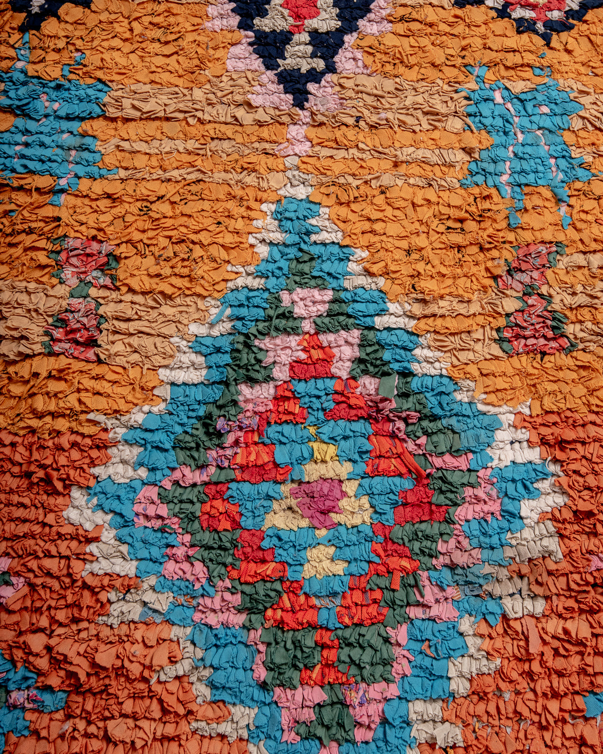 Modern designer vintage handcrafted Berber rug from Morocco. Boucherouite with beautiful colors and patterns.